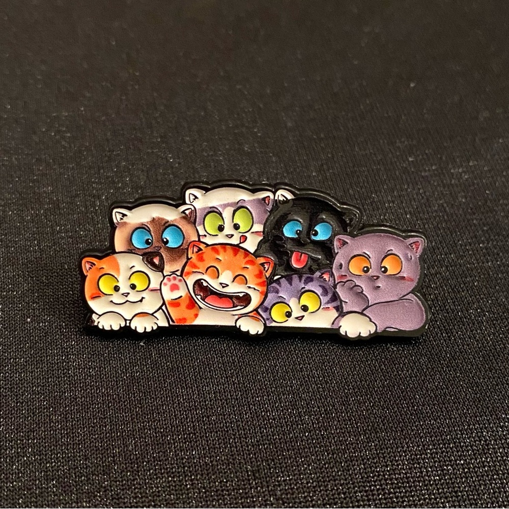 Silly cat lineup enamel pin/magnet brings a smile to your face